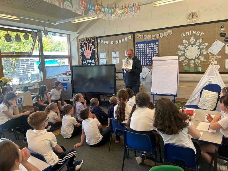 Author Paul Harrison reading to school children